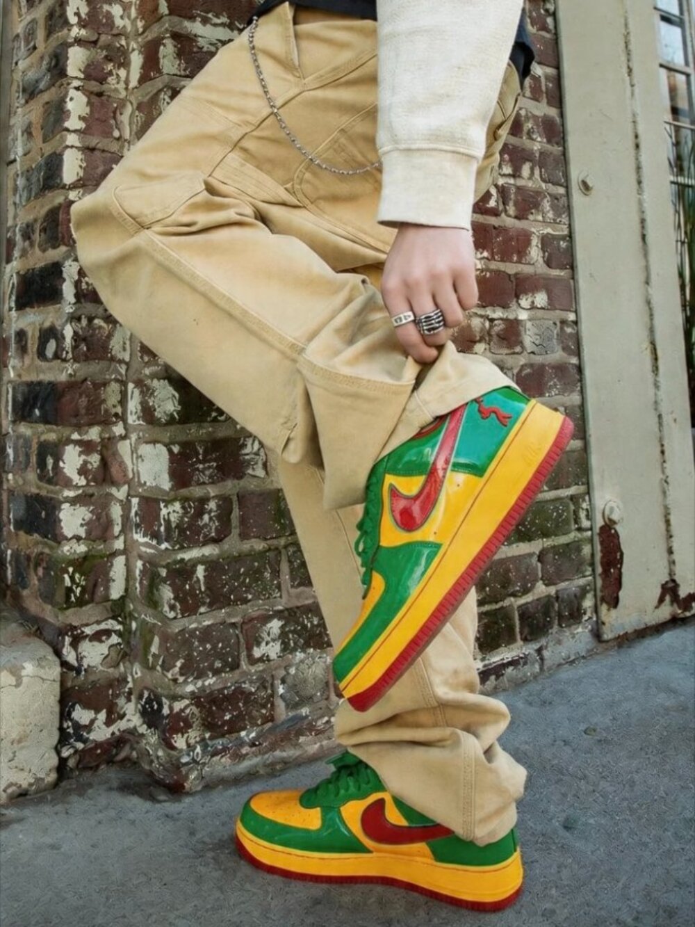 Nike × Lil Yachty Air Force 1 Low GS low cut sneakers in green, gold, and red
